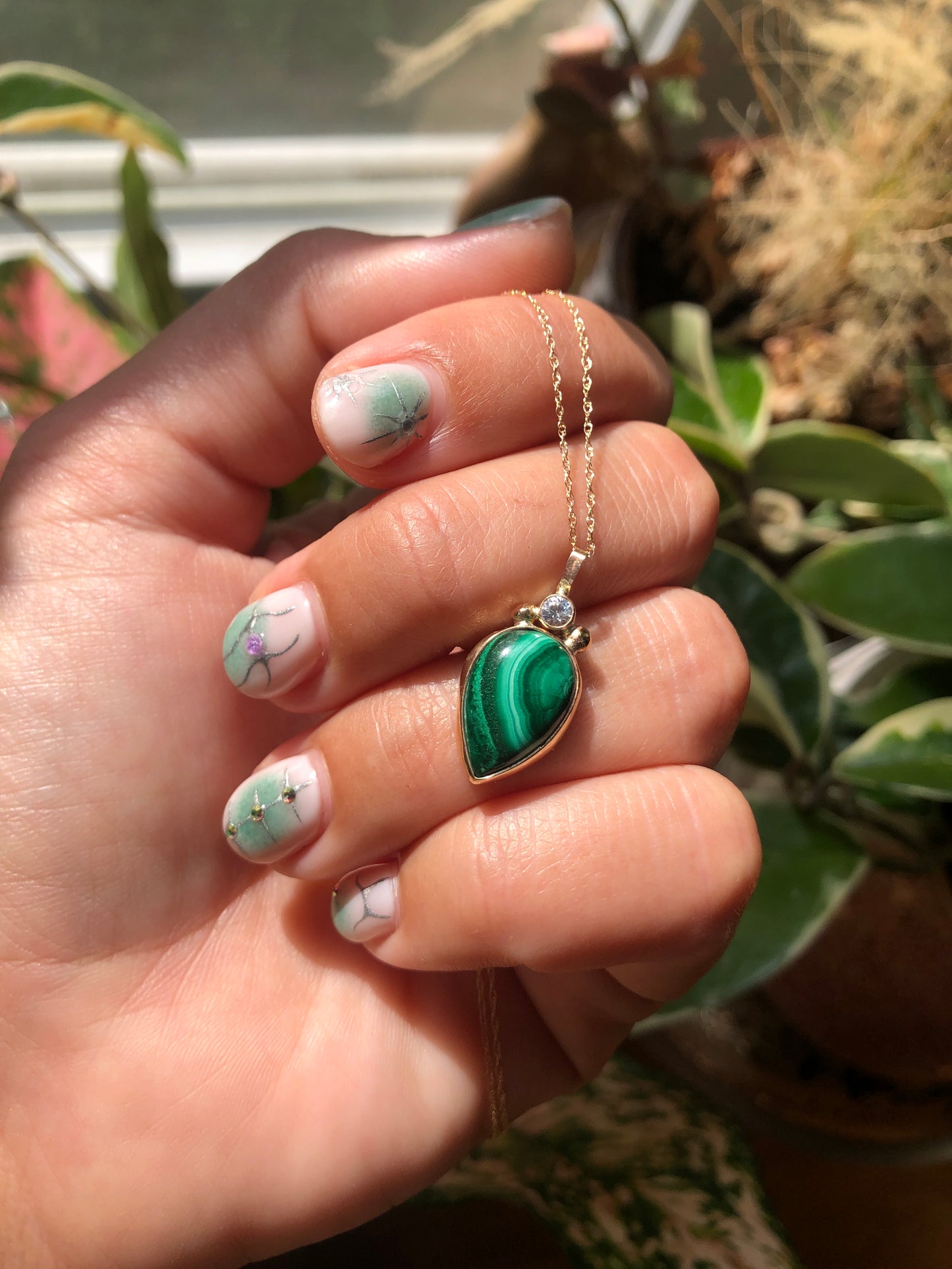 Malachite and CZ set in 10k gold