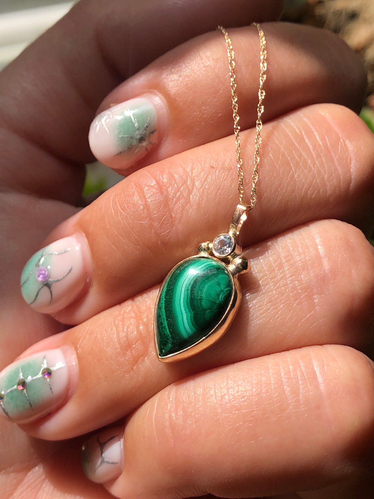 Malachite and CZ set in 10k gold