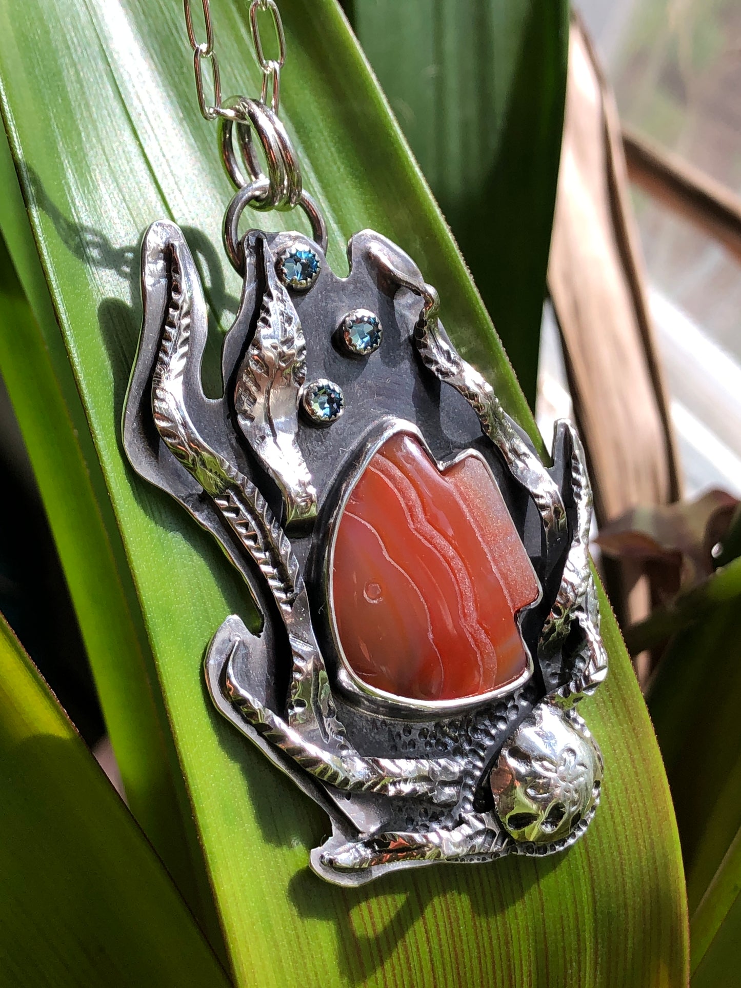 Carved Fish Agate Pendant