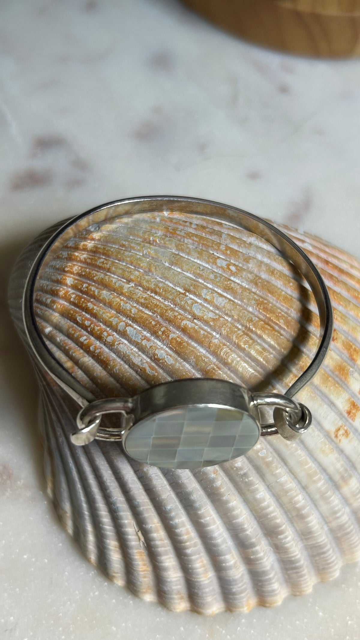 Inlay shell cuff