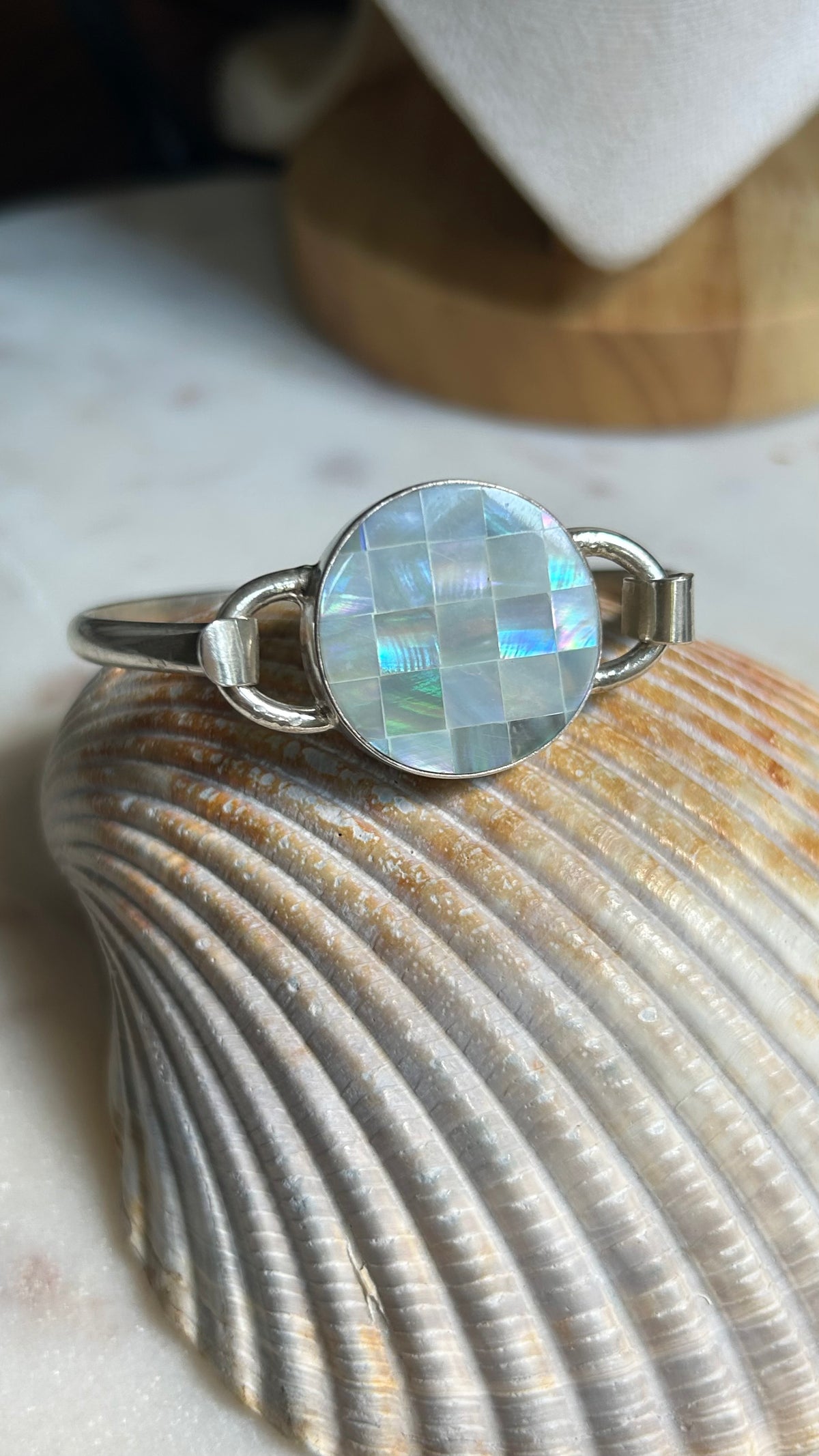 Inlay shell cuff