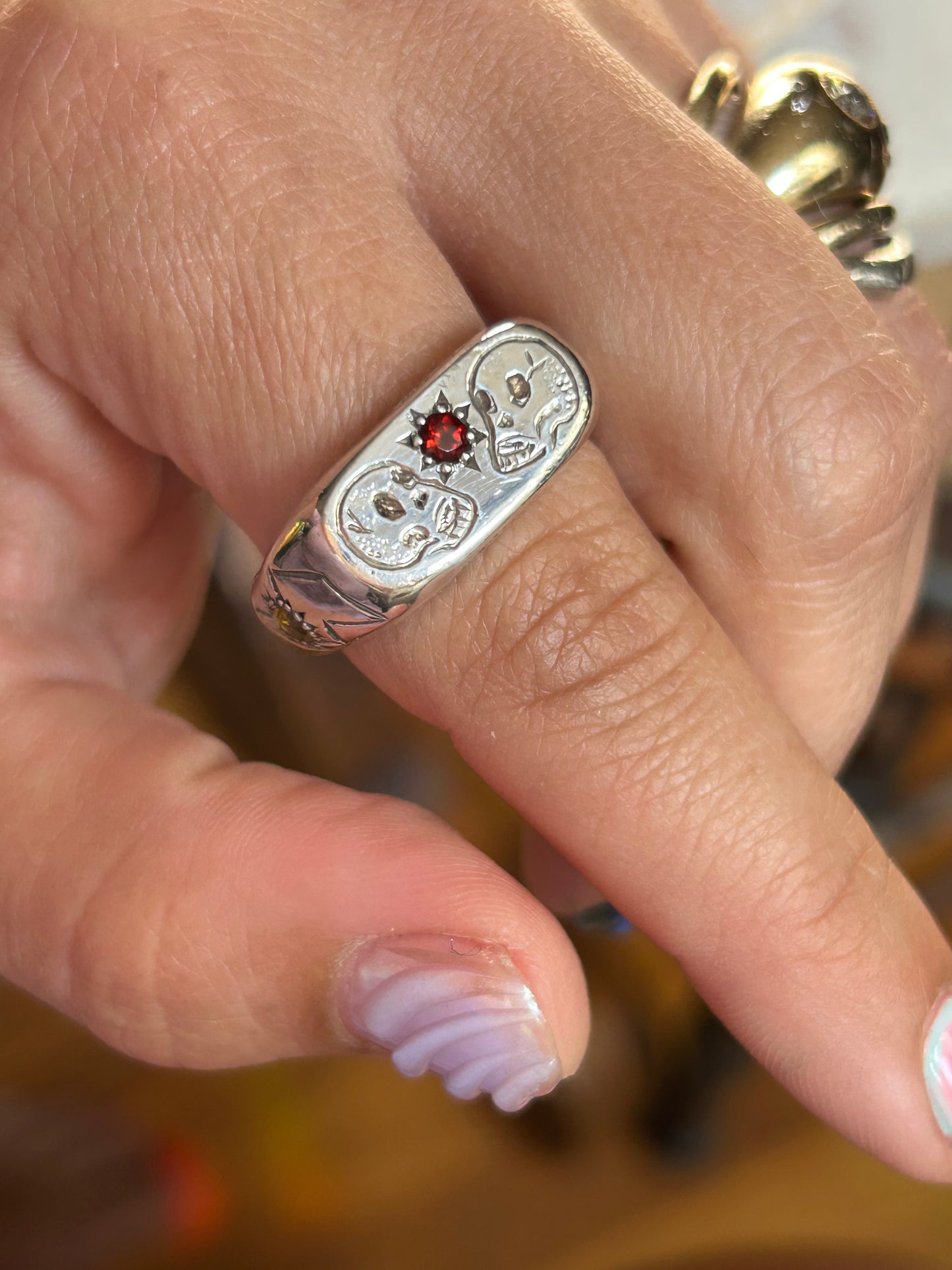 Blazar x HGJ ‘til death ring featuring Garnet, Citrine & Sapphire